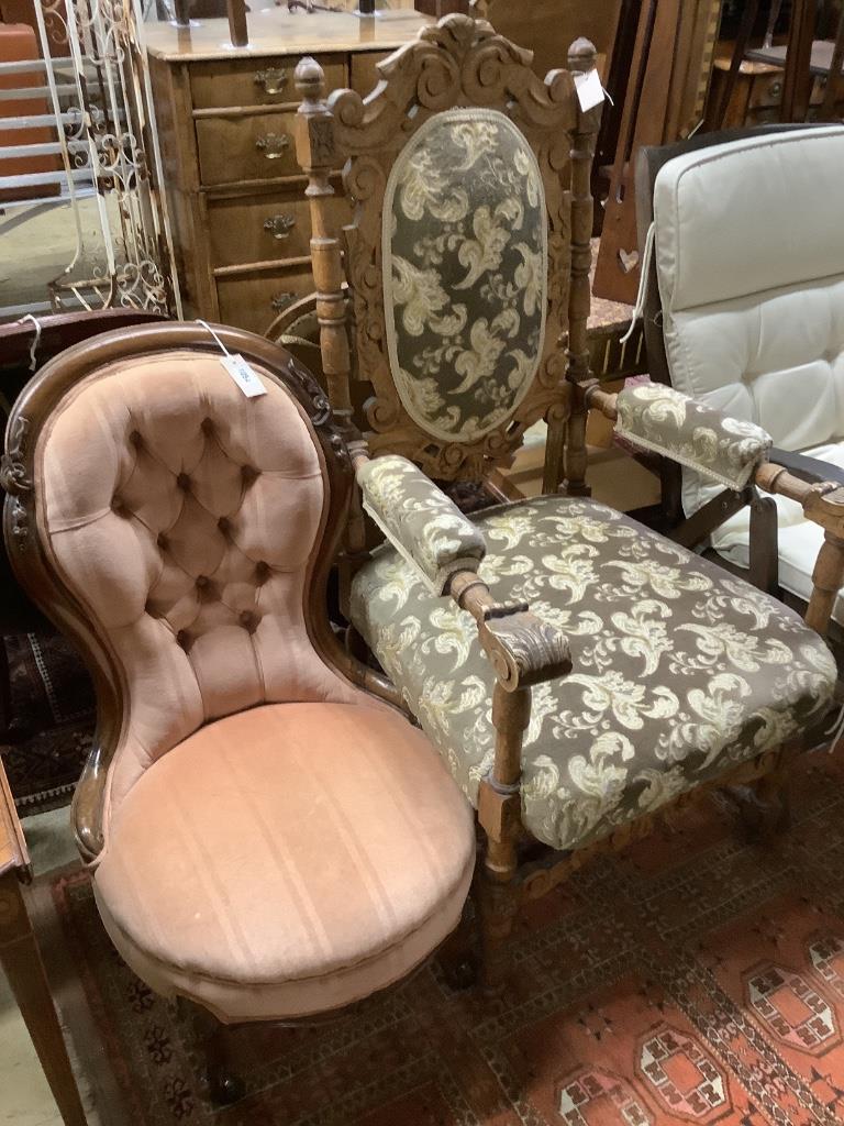 A Victorian mahogany buttonback nursing chair and a carved oak armchair